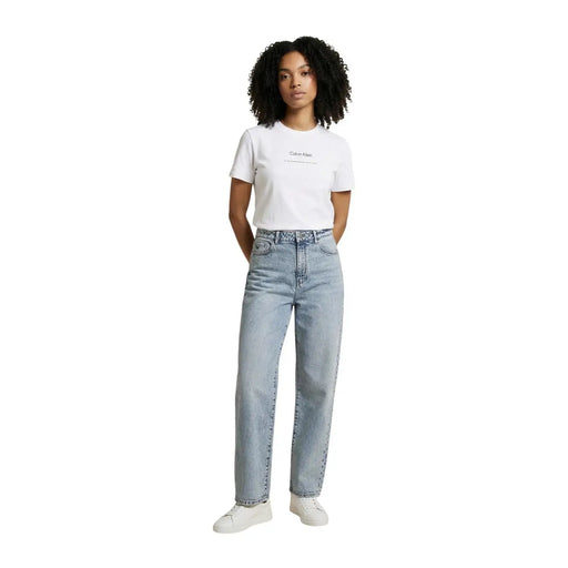 Light-wash denim jeans with high-rise straight leg and classic stitching paired with calvin klein women white cotton round neck t shirt