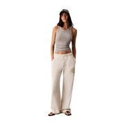 Calvin Klein Jeans women white cotton wide-leg trousers with drawstring waistband and embroidered logo on left thigh