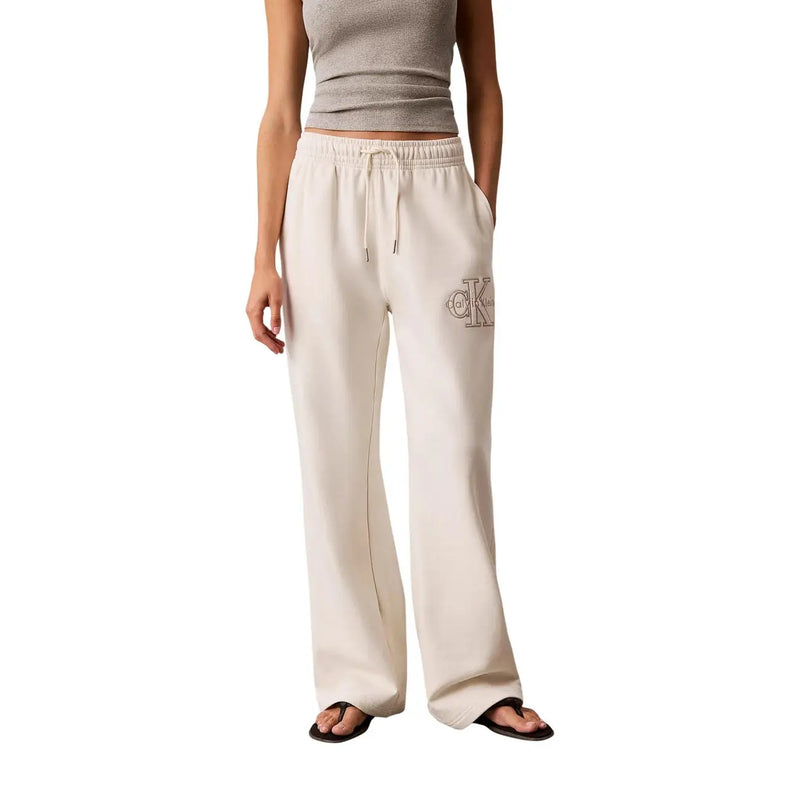 Calvin Klein Jeans women white cotton trousers with laces featuring cream-colored relaxed-fit sweatpants and ck logo
