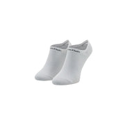 White Calvin Klein Jeans women gripper sneaker ankle socks with subtle textured knit and black logo on the heel back side