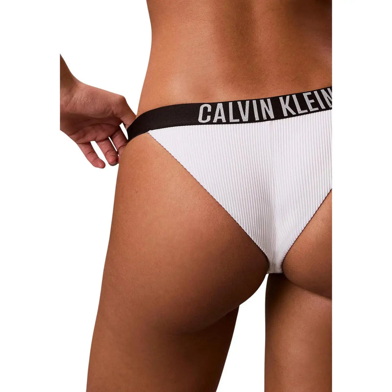 White ribbed calvin klein nylon brazilian bikini bottom with black waistband and white logo for women beachwear