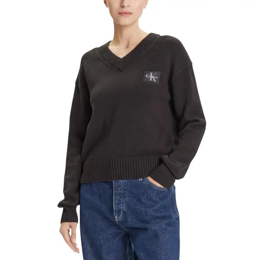 Women’s black V-neck sweater with ribbed hem and cuffs from Calvin Klein Jeans