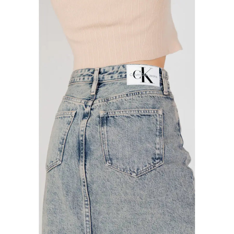 Light-wash denim Calvin Klein Jeans women’s blue cotton skirt with white logo label at the waistband 100 percent cotton