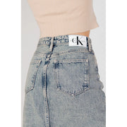 Light-wash denim Calvin Klein Jeans women’s blue cotton skirt with white logo label at the waistband 100 percent cotton