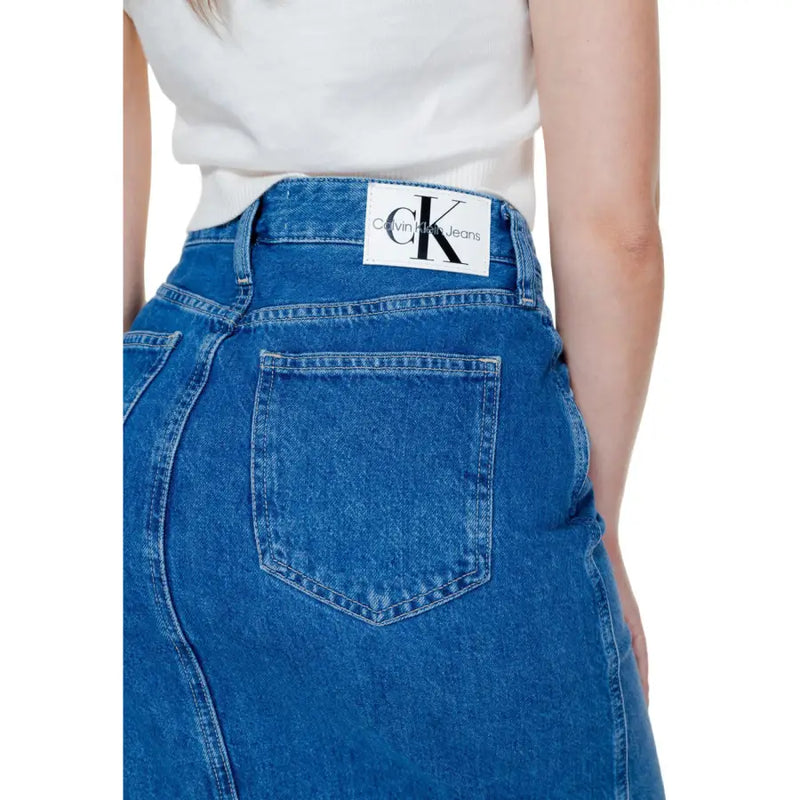Calvin Klein Jeans women’s blue cotton denim skirt with pockets and white logo patch at the waistband