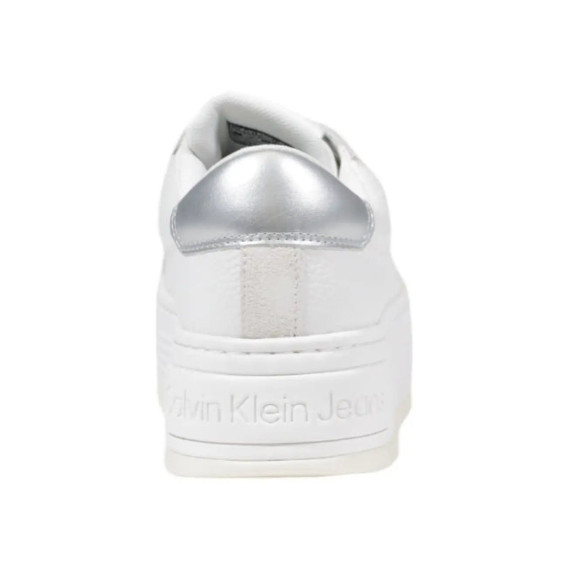 Calvin Klein Jeans women’s white platform sneakers with metallic silver heel tab and textured suede accents