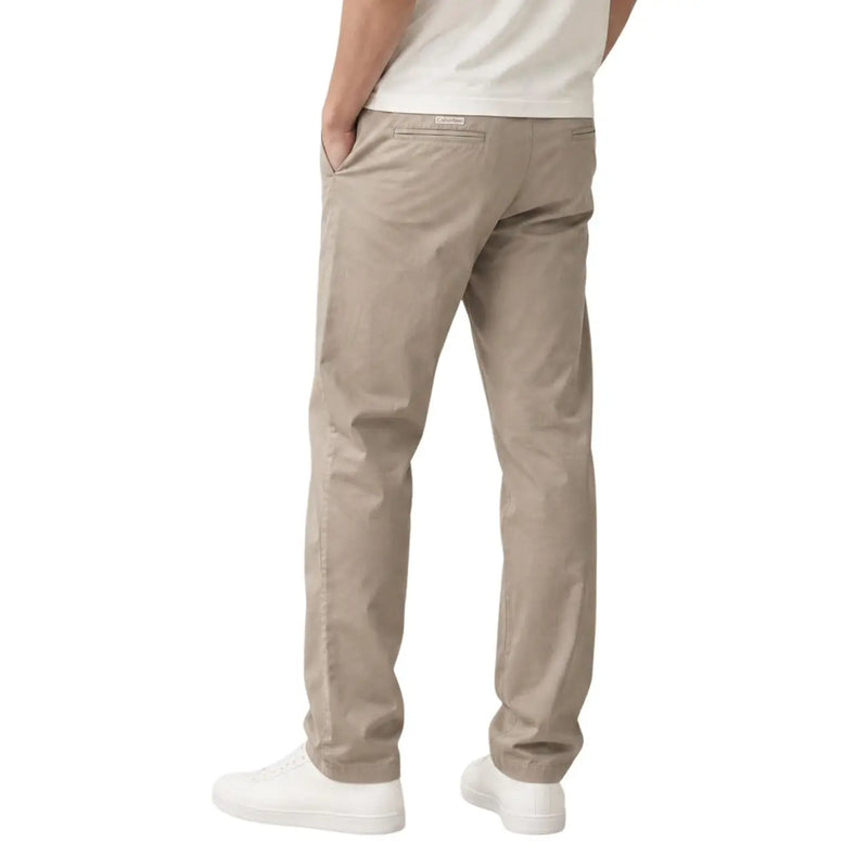 Calvin Klein men beige cotton trousers in khaki chino fabric with a clean straight-leg cut and subtle stitching details