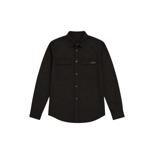 Calvin Klein Chemise noire à manches longues pour homme, en mélange de coton, avec deux poches poitrine et écusson de la marque.