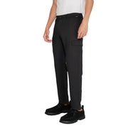 Men’s black cargo pants with black shoes from Calvin Klein, polyester viscose blend winter trousers