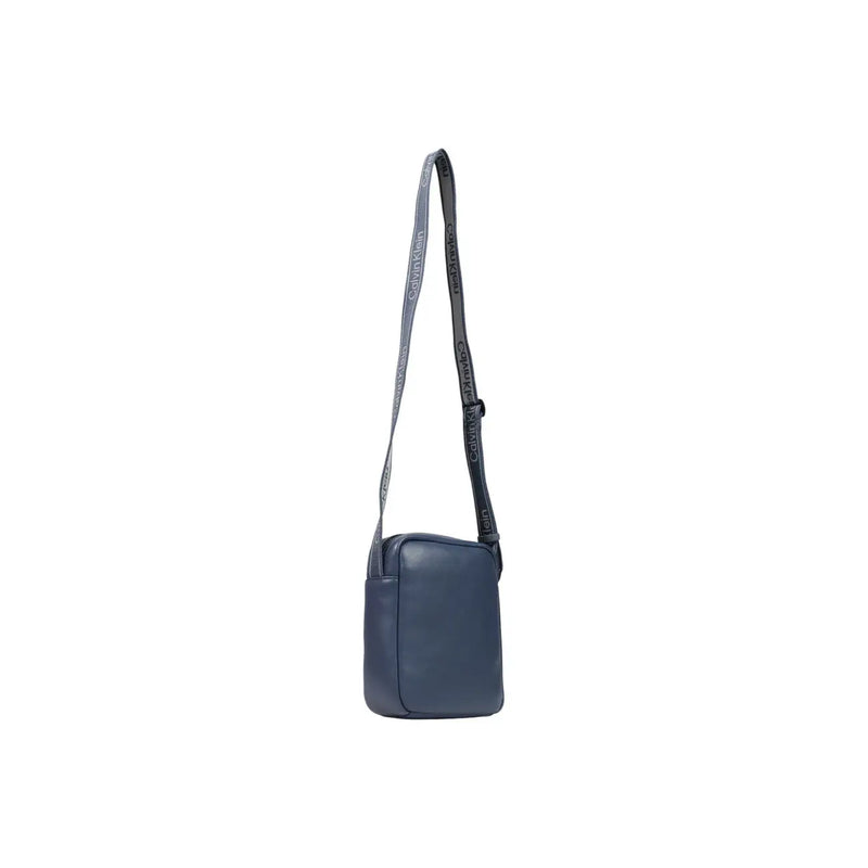 Navy blue leather Calvin Klein men bold logo webbing reporter crossbody bag with gray and black branded strap W18cm