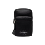 Black Calvin Klein men bold logo webbing sling bag with sleek minimalist design and subtle front logo in 17cm size