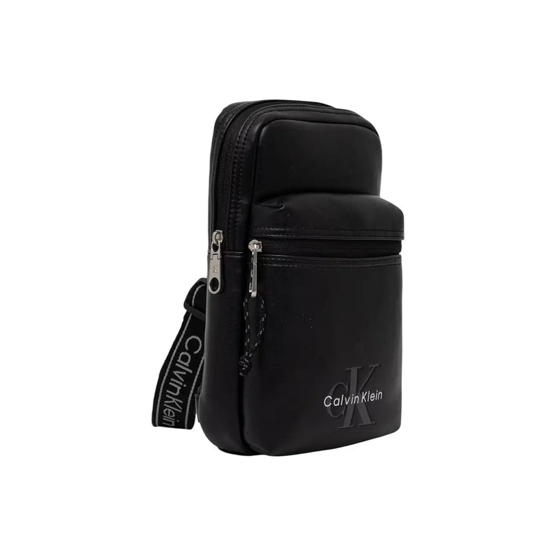 Calvin klein men bold logo webbing sling bag black with sleek minimalist design and silver-toned zippers