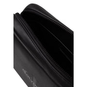 Calvin klein men bold pouch black polyurethane with sleek zipper closure and subtle embossed logo, front view