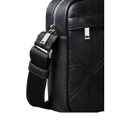 Calvin Klein men emblem reporter bag in black leather with embossed geometric pattern and silver-toned hardware