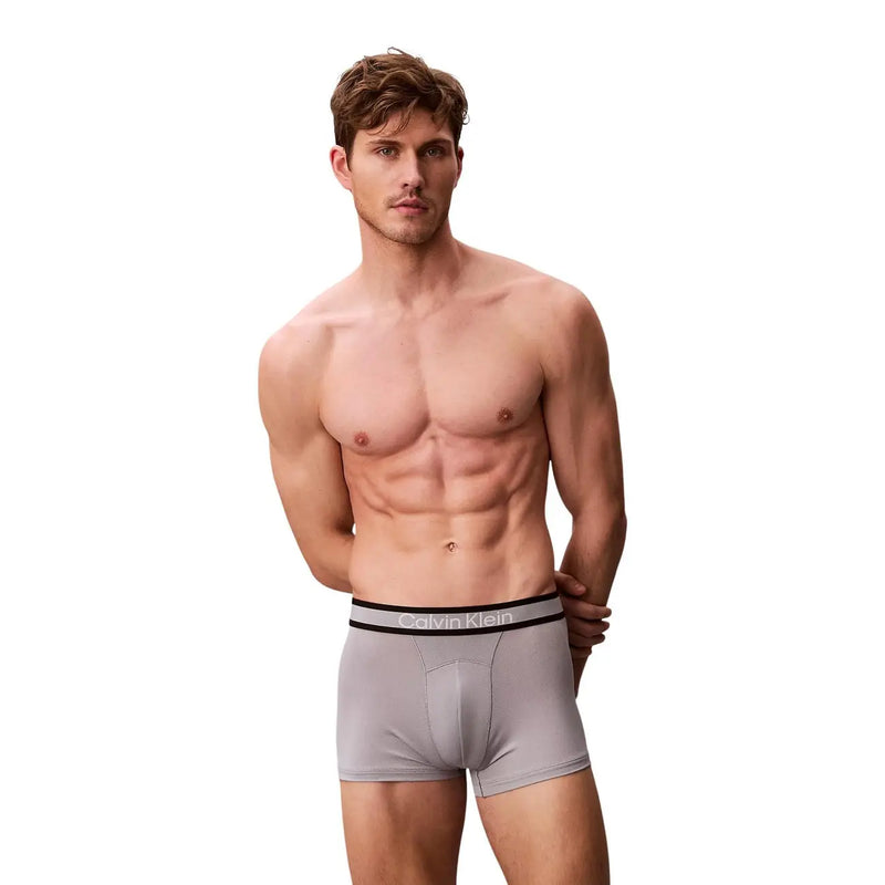 Calvin Klein men green cotton trunk underwear featuring gray boxer briefs with black waistband and white logo