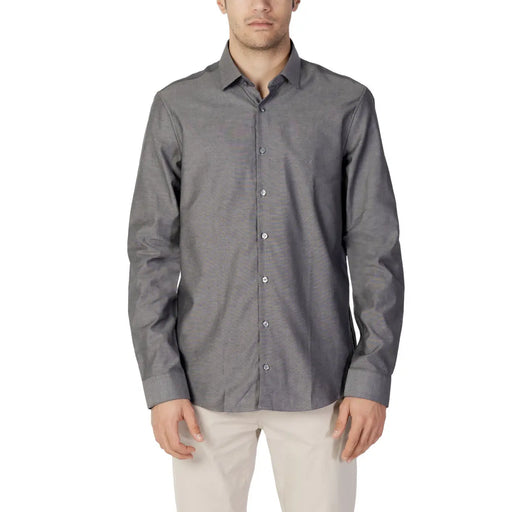 Calvin Klein Chemise homme en coton gris chiné, coupe classique, manches longues, tissage texturé et col impeccable