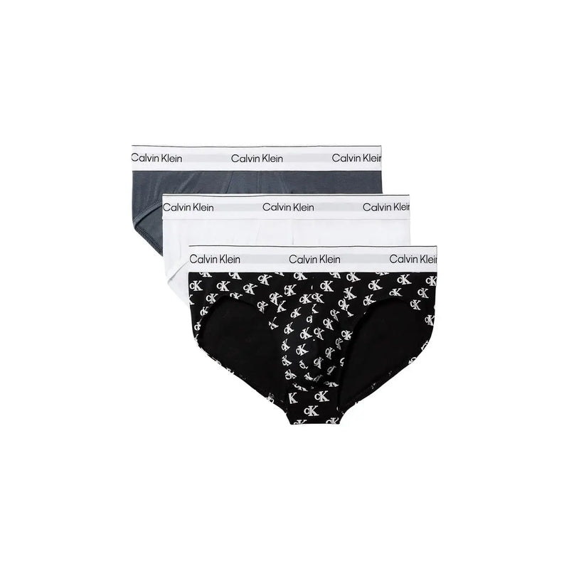 Calvin Klein Dreierpack Herren-Hüftslips aus grauem, weißem und schwarzem Baumwoll-Elastan mit sich wiederholendem CK-Logo-Muster auf einem Paar