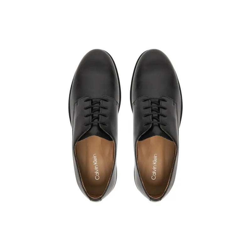 Calvin klein men leather lace up oxford shoes in elegant black leather shown from the back side