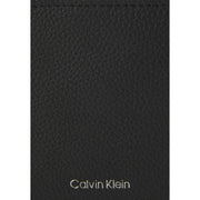 Calvin Klein men wallet in black textured leather with silver Calvin Klein logo on front side