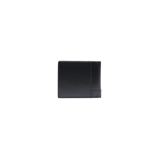 Portefeuille homme Calvin Klein en cuir noir, format compact, avec perforations discrètes et poche zippée (réf. W2).