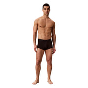 Black men’s briefs by Calvin Klein underwear featuring smooth, form-fitting design in black for everyday comfort