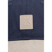 Navy blue denim cotton cap with beige leather calvin klein logo patch from calvin klein men mixed media colorblock collection
