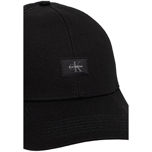 Calvin Klein Schwarze Herren-Truckerkappe aus Baumwolle mit Monologo, dezent strukturiertem Stoff und kleinem, gesticktem Logo-Aufnäher