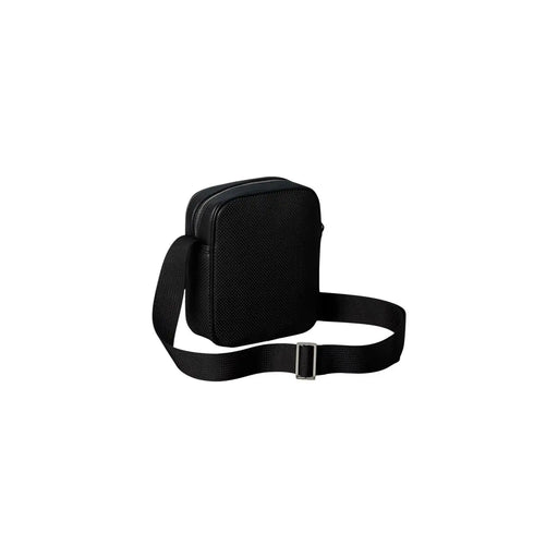 Calvin Klein men perforated black crossbody bag with silver buckle and adjustable strap in textured leather