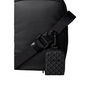 Black Calvin Klein puffer utility reporter bag with textured patterned pouch attached to crossbody strap size W16