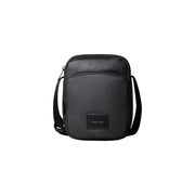Black calvin klein men puffer utility reporter bag with sleek minimalist design and subtle front brand patch size w16