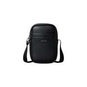 Black calvin klein men shoulder bag in textured polyurethane leather with minimalist design 11.5x18x5 cm