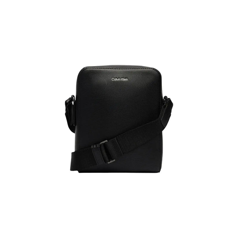 Black Calvin Klein men shoulder bag with textured polyurethane leather and adjustable crossbody strap 17x21x7 cm