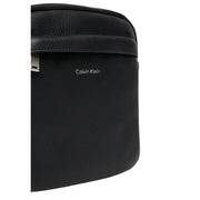 Calvin Klein men shoulder bag in black leather with silver-tone hardware and zip pockets 18x23x7 cm