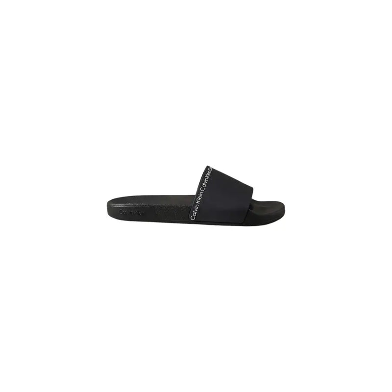 Black calvin klein men slippers with polyurethane slide sandal, sleek minimalist design and white logo on strap