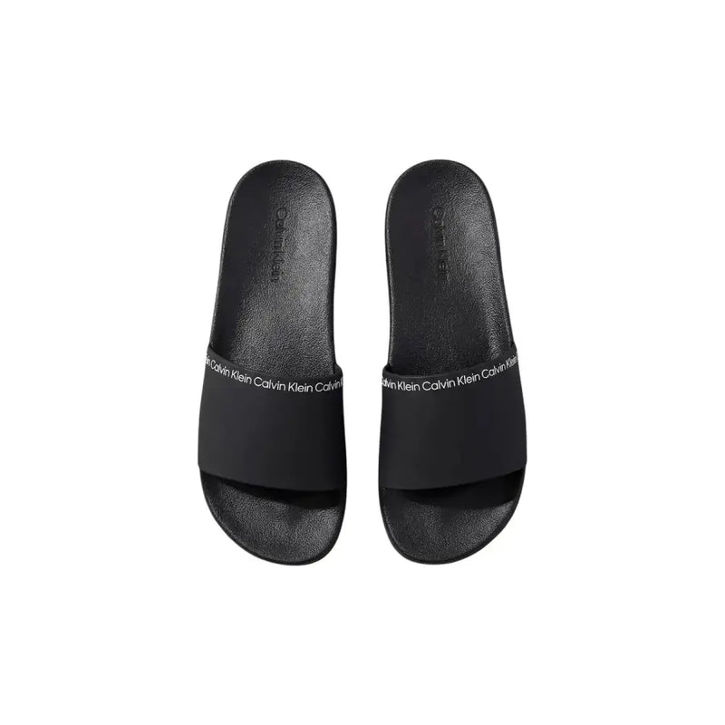 Black calvin klein men slippers with open toe design, polyurethane material, and signature logo on the strap