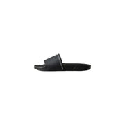 Black calvin klein men slippers with a sleek minimalist design open toe polyurethane slide sandal with white branding