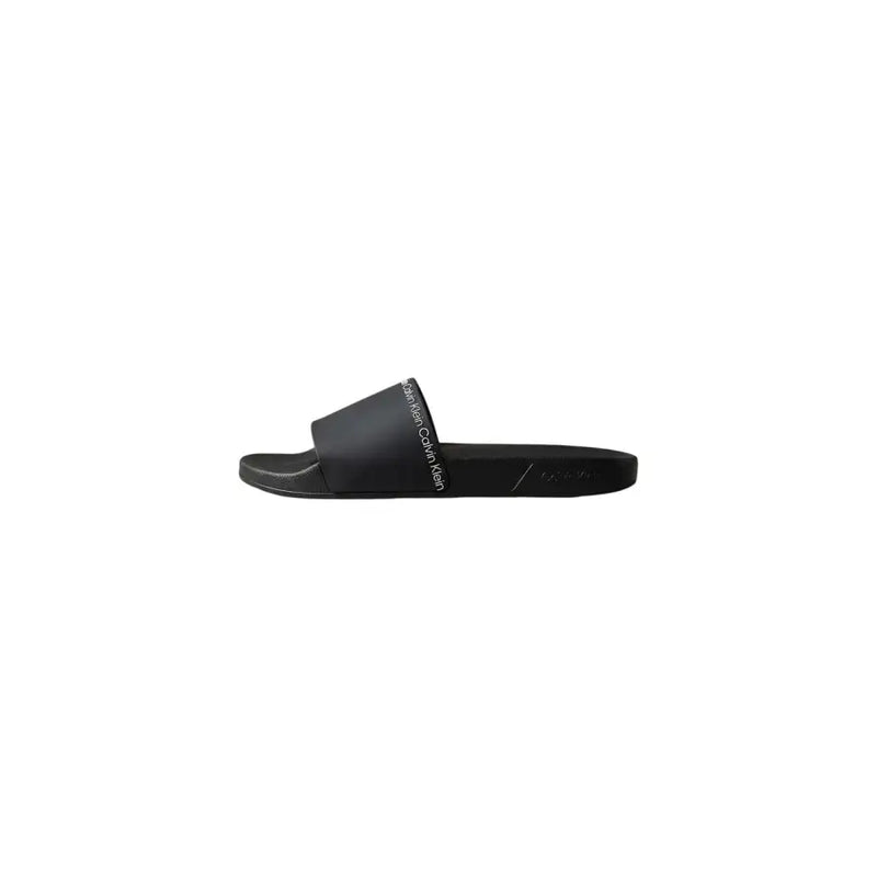 Black calvin klein men slippers with a sleek minimalist design open toe polyurethane slide sandal with white branding