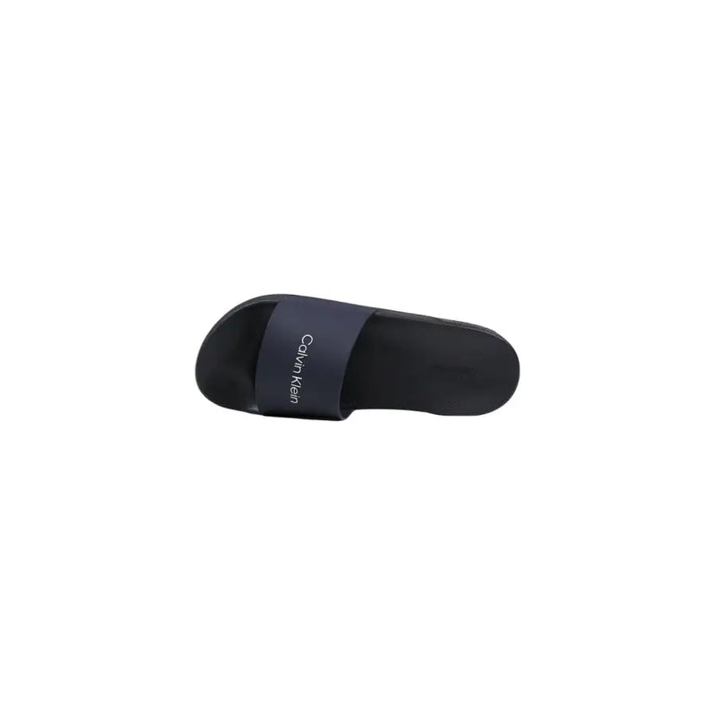 Black Calvin Klein men slide sandal with minimalist design and subtle branding on polyurethane strap HM0HM02107