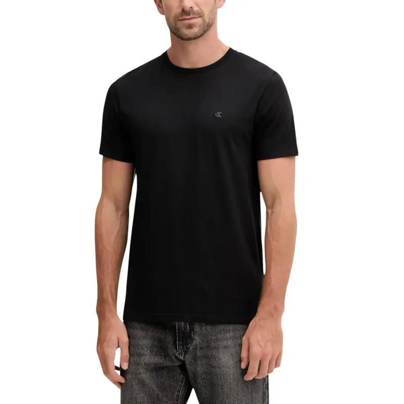 Black Calvin Klein men t-shirt with short sleeves and subtle embroidered logo on left chest for casual wear