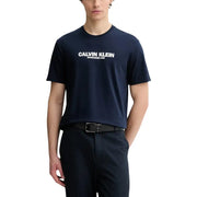 Navy blue Calvin Klein men t-shirt with white Calvin Klein established 1986 logo across the chest