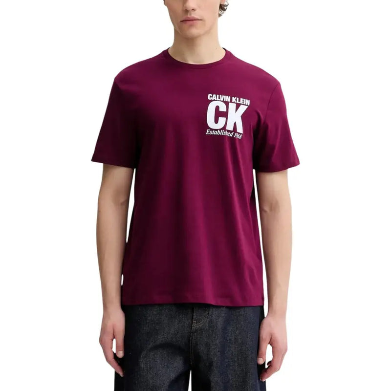 Maroon Calvin Klein men t-shirt featuring a white ck established 1986 logo on the chest, ideal for casual wear