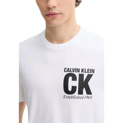 White Calvin Klein men t-shirt featuring bold black CK logo and established 1968 text on the front