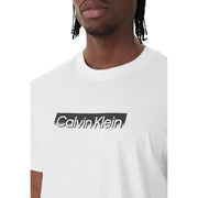 White Calvin Klein men t-shirt featuring a black rectangular logo with bold distressed lettering on the front