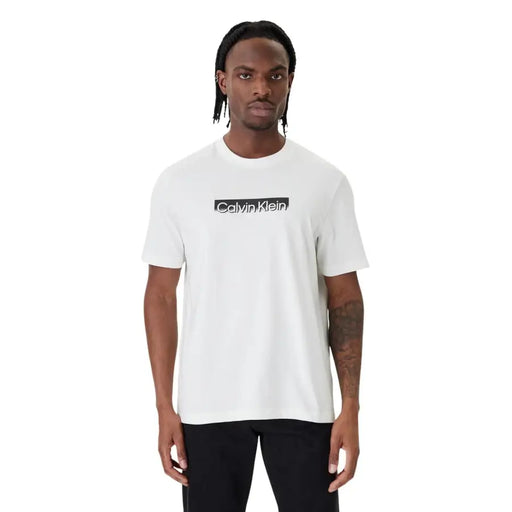 Calvin Klein men t-shirt in white cotton with a black rectangular logo across the chest for casual wear