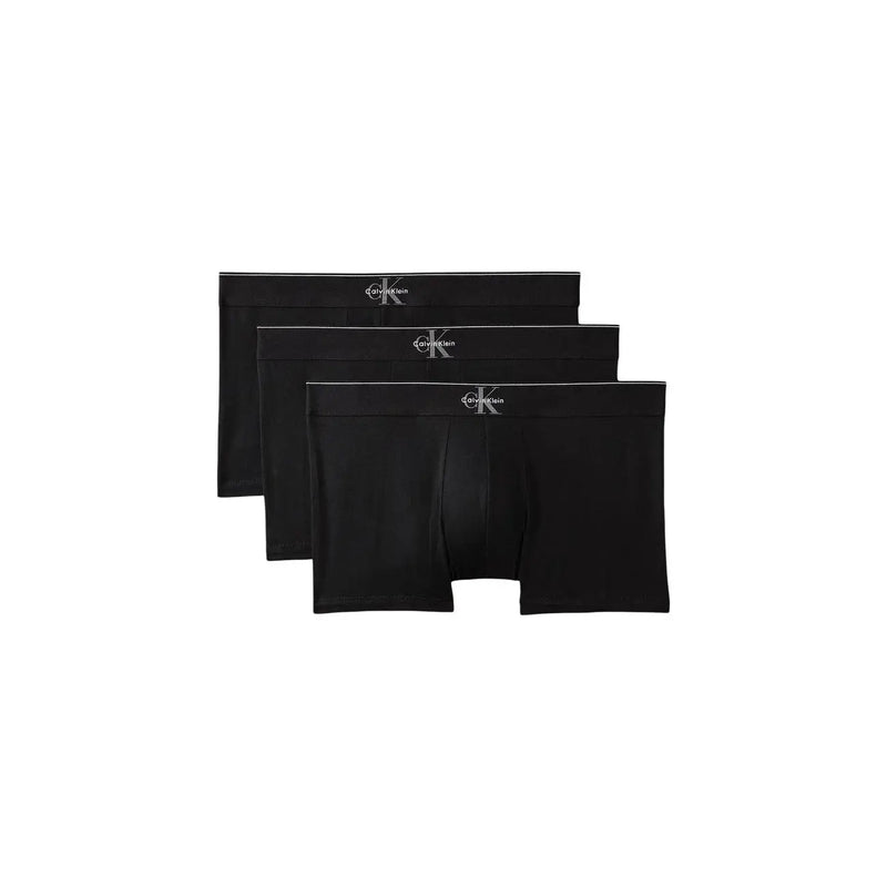 Black calvin klein boxer briefs with subtle white logo on waistband in cotton for men underwear use