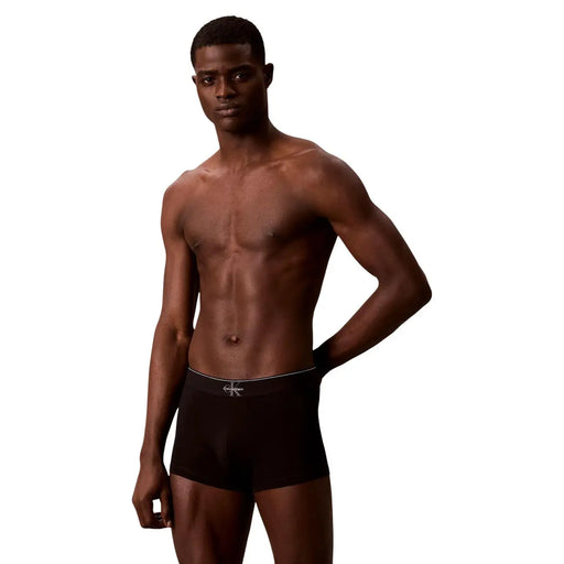 Black calvin klein underwear boxer briefs with white logo and trim designed for men by calvin klein underwear