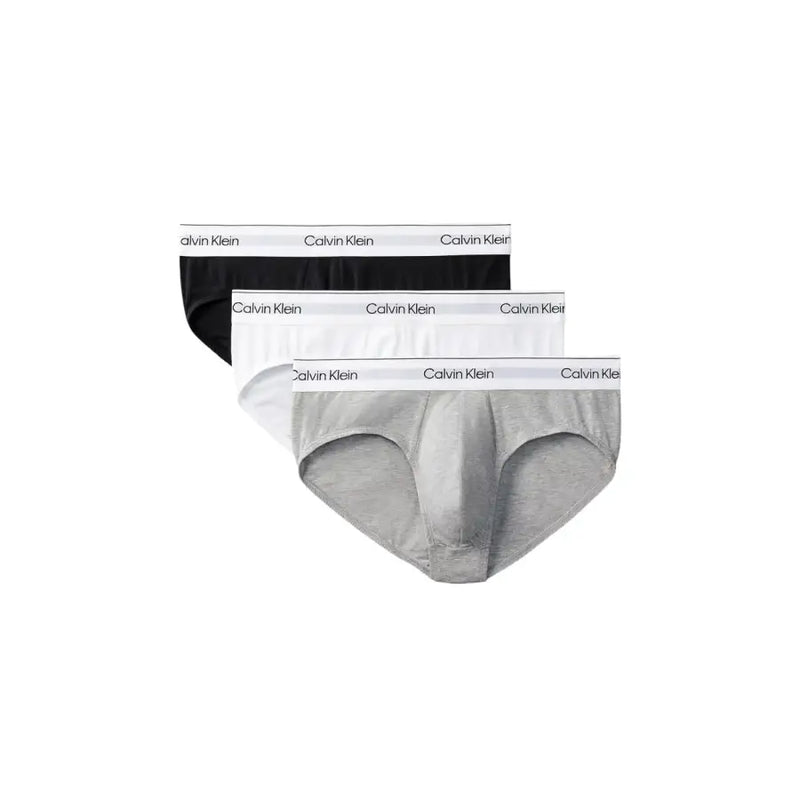 Calvin Klein Slips pour hommes, disponibles en noir, blanc et gris chiné, avec ceinture élastique signature.