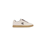 Calvin Klein men white suede sporty low-top sneaker with black laces tan rubber sole and ck logo on side