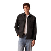 Calvin Klein Chemise noire classique en coton pour homme, manches longues, deux poches poitrine et col, idéale pour les occasions formelles.