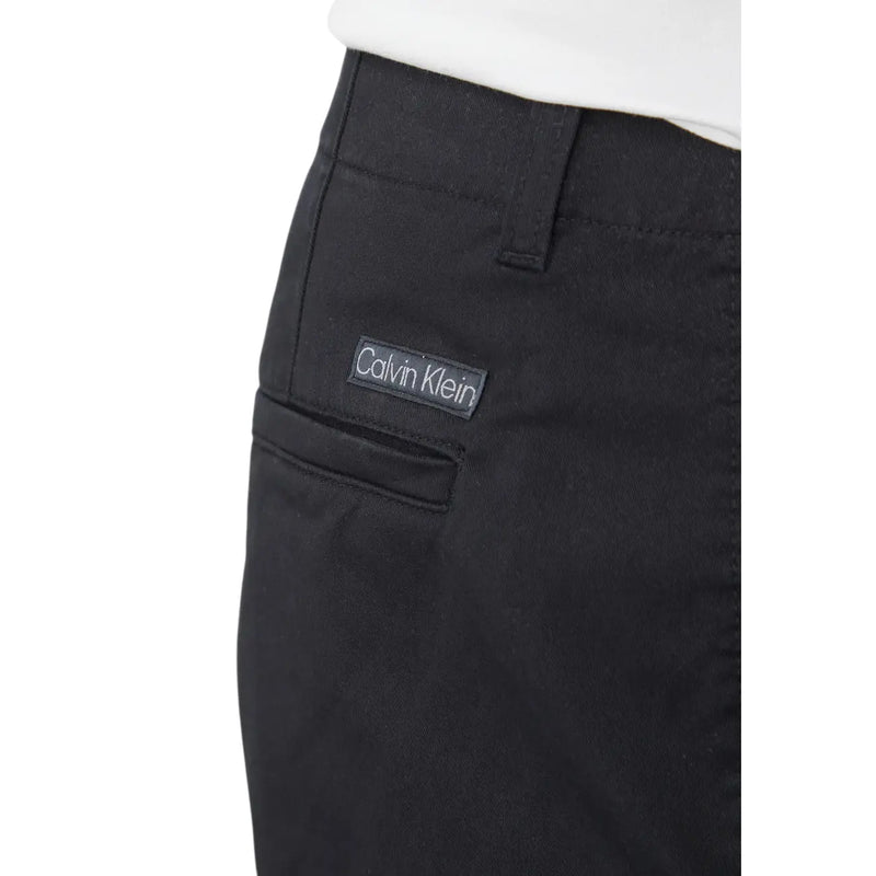 Calvin Klein mens black cotton chino trousers with subtle woven texture and sleek minimalist design